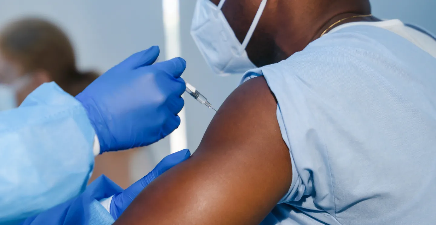 person receiving the COVID-19 vaccine