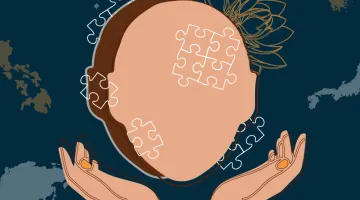 hands around a head with puzzle pieces and a map background